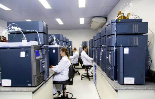 Image of employees in an environment with machines